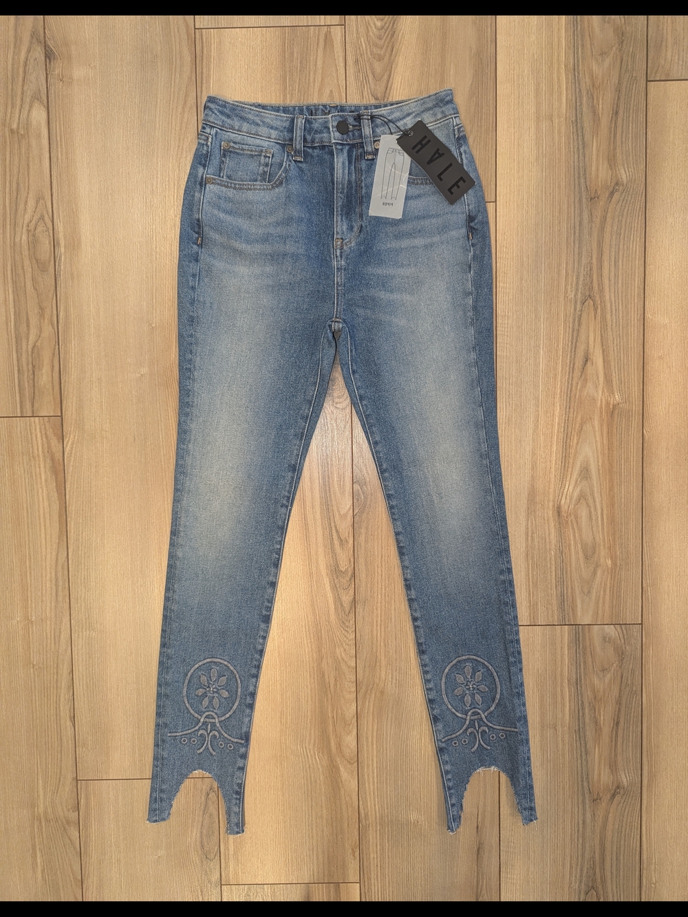 High-Rise Light Blue Skinny Jeans with Embroidered Notch Hem